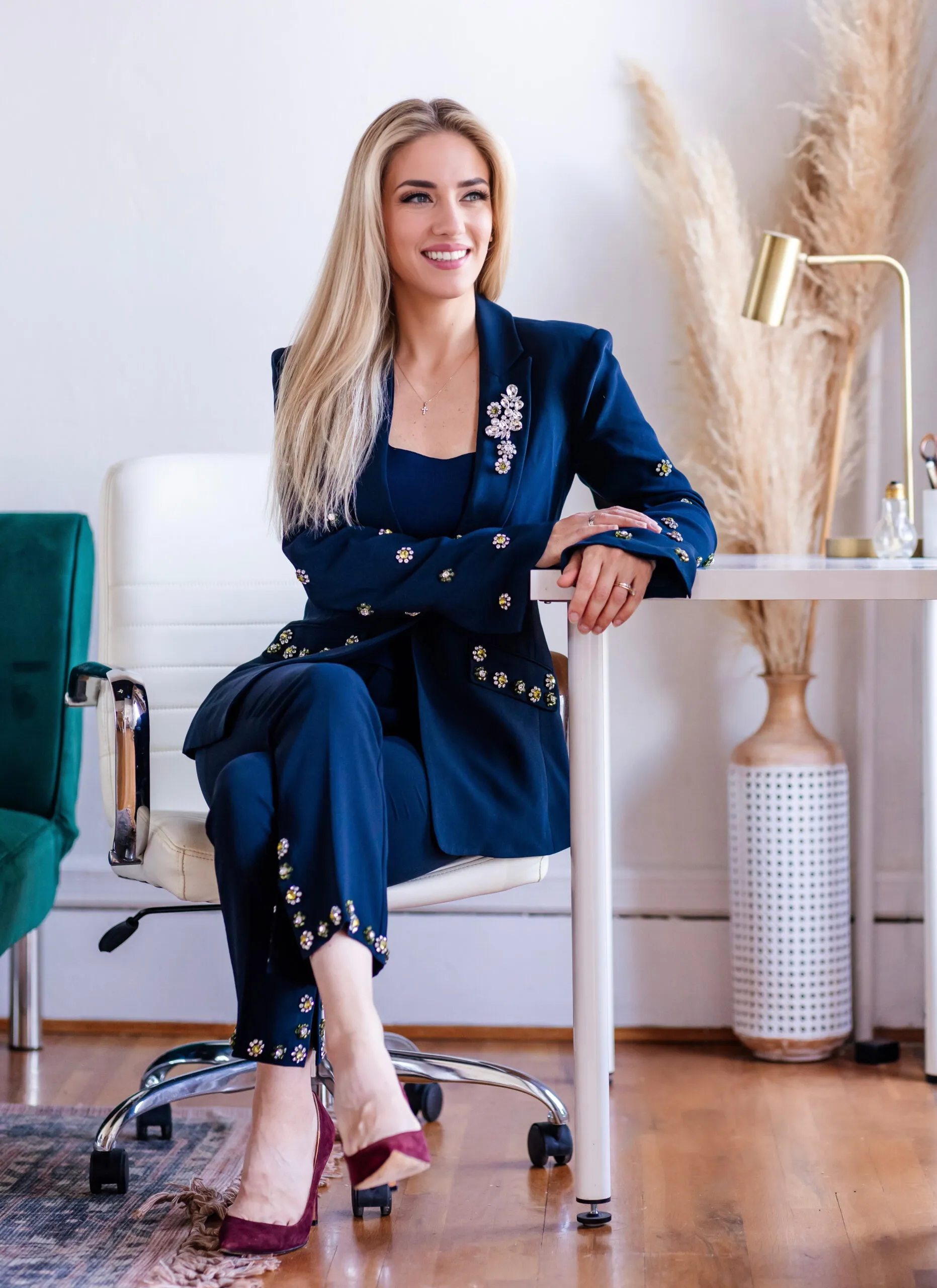 Dr. Casey Hughes seated at her desk